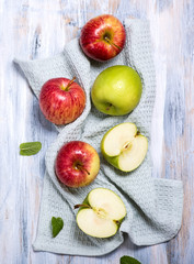Fresh red and green apples, top view