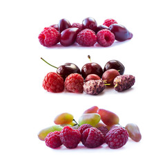 Pink berries isolated on white background. Ripe raspberries, cherries, mulberries, gooseberries and grapes. Background of mix berries with copy space for text. Mix berries on white background. 