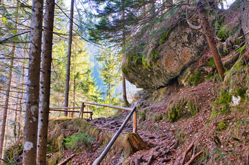 The picturesque path leading to  Pericnik waterfall. Winter forest landscape