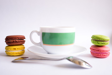 cup of tea and cookies isolated on white