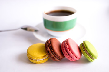 colorful macaroons and cup of coffee