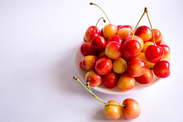 Obraz na płótnie Canvas cherries on a white background