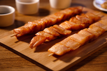 Fish barbecue with glass of bear