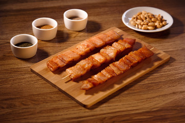 Fish barbecue with glass of bear