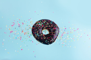 flying doughnuts on blue