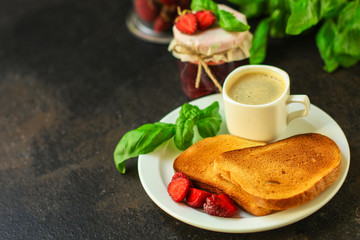 breakfast Toast, strawberry jam and coffee (tasty snack with basil, dessert). food background. top view. copy space
