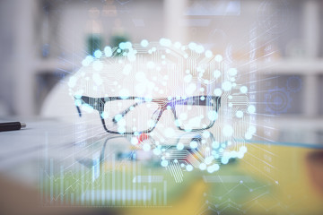 Brain drawings with glasses on the table background. Double exposure.