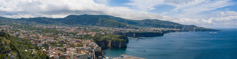 Fototapeta na wymiar Panorama of the Gulf of Sorrento, seen from the city of Meta, during a sunny summer day
