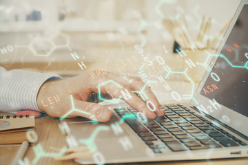 Science formula hologram with man working on computer on background. Education concept. Double...