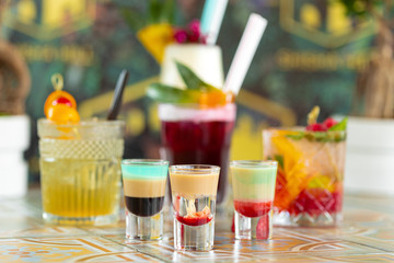 Colorful cocktails on top of the bar, summer coctails