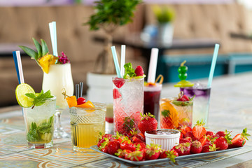 Summer colorful refreshing cocktails with strawberry decoration. Raspberry Mojito Lemonade 