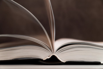 open book on gray background. Back to school