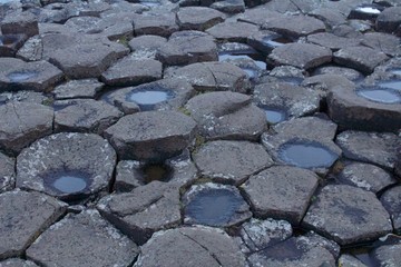 View of the Rocks of Giants Causeway with Puddles on some rocks