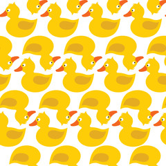 Cute yellow rubber duck with eye, orange beak, tale, wing, without paws, topknot, crest. Vector seamless pattern. Customized fun background. For cards, baby shower, celebration, paper, fabric,