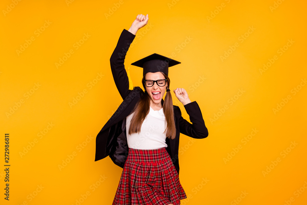 Sticker Portrait of delighted thrilled millennial cute youth raise fists scream yes yeah eyewear eyeglasses pullover checked plaid tails sweater isolated yellow background black jacket blazers