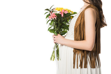 cropped view of pregnant boho woman holding flowers isolated on white