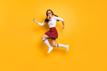 Fototapeta na wymiar Full length body size view portrait of her she nice attractive lovely cheery cheery glad girl wearing eyeglasses eyewear rapid rush hour sale discount isolated on bright vivid shine yellow background