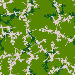 Forest camouflage of various shades of green and beige colors