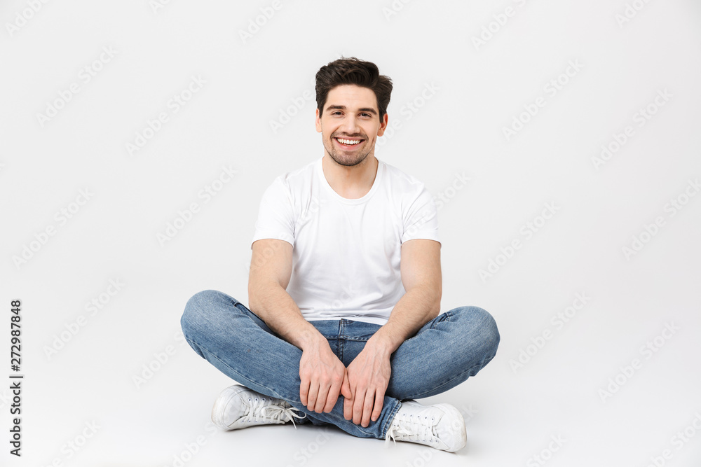 Canvas Prints Happy young excited emotional man posing isolated over white wall background.