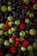 close up of assorted summer berries, top view