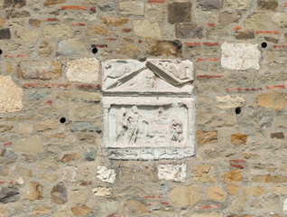 Remains  of a medieval bas-relief on the fortress wall in the ruins of the Smederevo fortress, standing on the banks of the Danube River in the city of Smederevo in Serbia.
