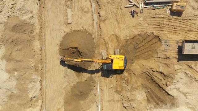 Heavy machinery works of a motorway - Highway Construction. Aerial View