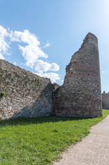 The remains  of the fortress wall and the clock tower in the ruins of the Smederevo fortress, standing on the banks of the Danube River in Smederevo town in Serbia.