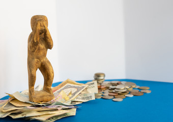 crying monkey with money on the white background