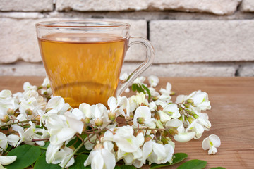 Tea with robinia acacia flowers