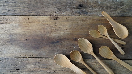 spoons on wooden background