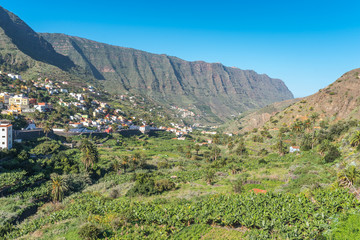 The valley of Hermigua with several villages, high mountains and agricultural exploiting in the north-east of the island of La Gomera
