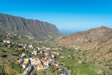 The valley of Hermigua with several villages, high mountains and agricultural exploiting in the north-east of the island of La Gomera