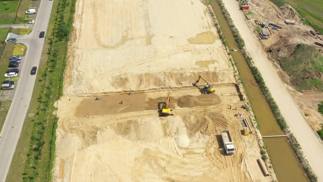 Road construction machinery on the construction of highway.Aerial View