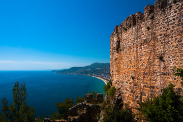 Fototapeta na wymiar Beautiful view of the Mediterranean Sea, the mountains, the forest, the city and the old fortress. Turkey, Alanya.