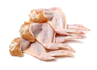 Raw chicken wings on a white background