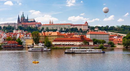 Fototapeta premium Prague city on bank of Vltava River, Czech Republic
