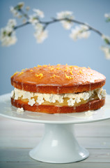 Layered lemon cake with cream and lemon curd