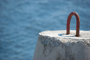 Fototapeta premium breakwater on the river in summer blue sky macro