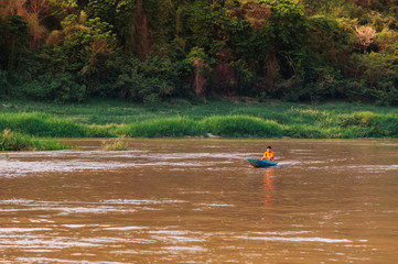 Rural scene Mae khong river local fisherman boat in Luang Prabang - Laos