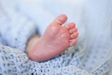 Newborn little baby foot - close up