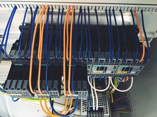 Industrial conveyor line at the factory for metal parts. Pretreatment of the surface of parts and...