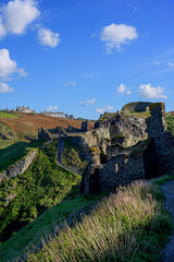 Obraz premium View of Tintagel Island and legendary Tintagel castle ruins