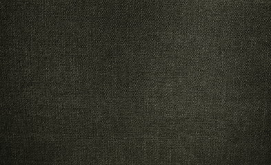 Obraz na płótnie Canvas Dunkle Stofftextur schwarz grau als Hintergrund