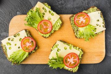 Flat lay of healthy food on wooden board