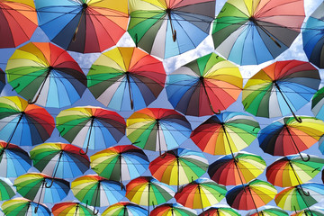 Colorful umbrellas background. Lots of umbrellas coloring the sky in the city of Odessa, Ukraine. Street decoration