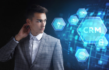 The concept of business, technology, the Internet and the network. A young entrepreneur working on...