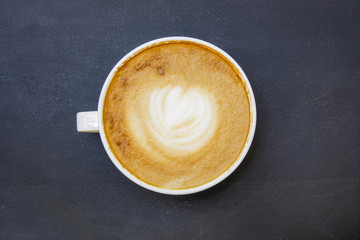 Obraz na płótnie Canvas Top view cup of coffee