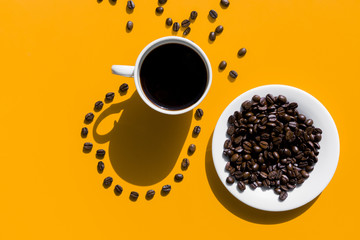 Top view cup of coffee with grains