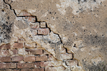 Old Weathered Concrete Wall Texture With Some Bricks Visible