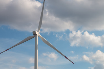 Fototapeta premium wind turbine against blue sky